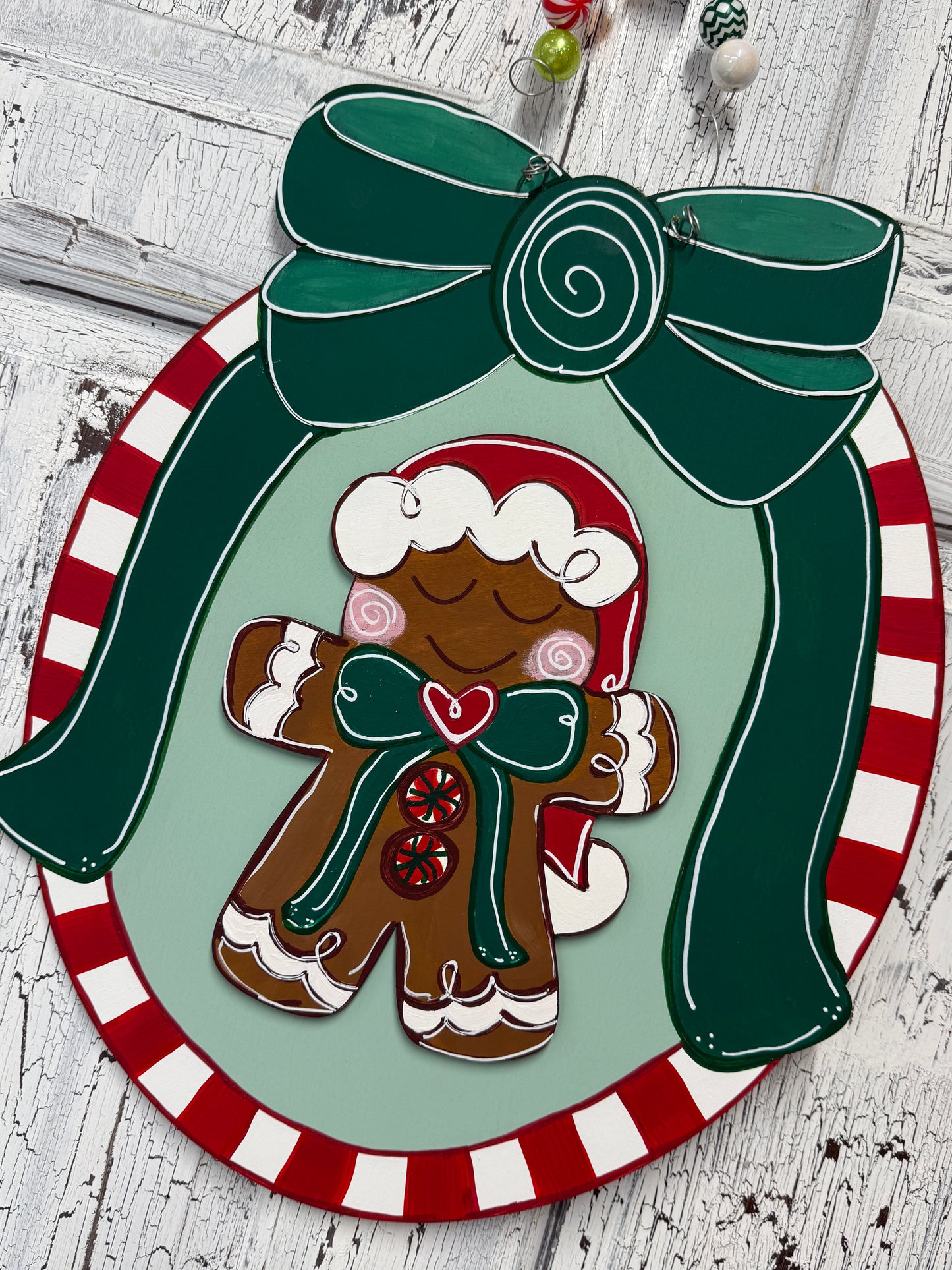Whimsical Gingerbread Christmas Door Hanger with Candy Cane Stripes and Green Bow – Hand Painted Holiday Wood Decor
