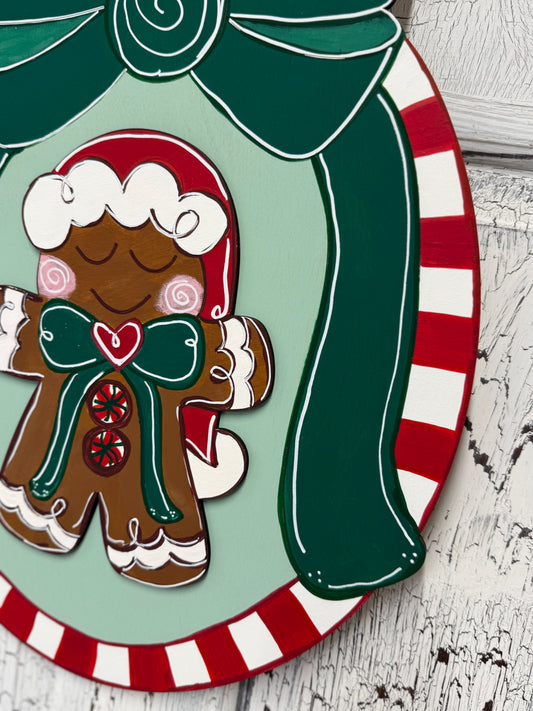 Whimsical Gingerbread Christmas Door Hanger with Candy Cane Stripes and Green Bow – Hand Painted Holiday Wood Decor